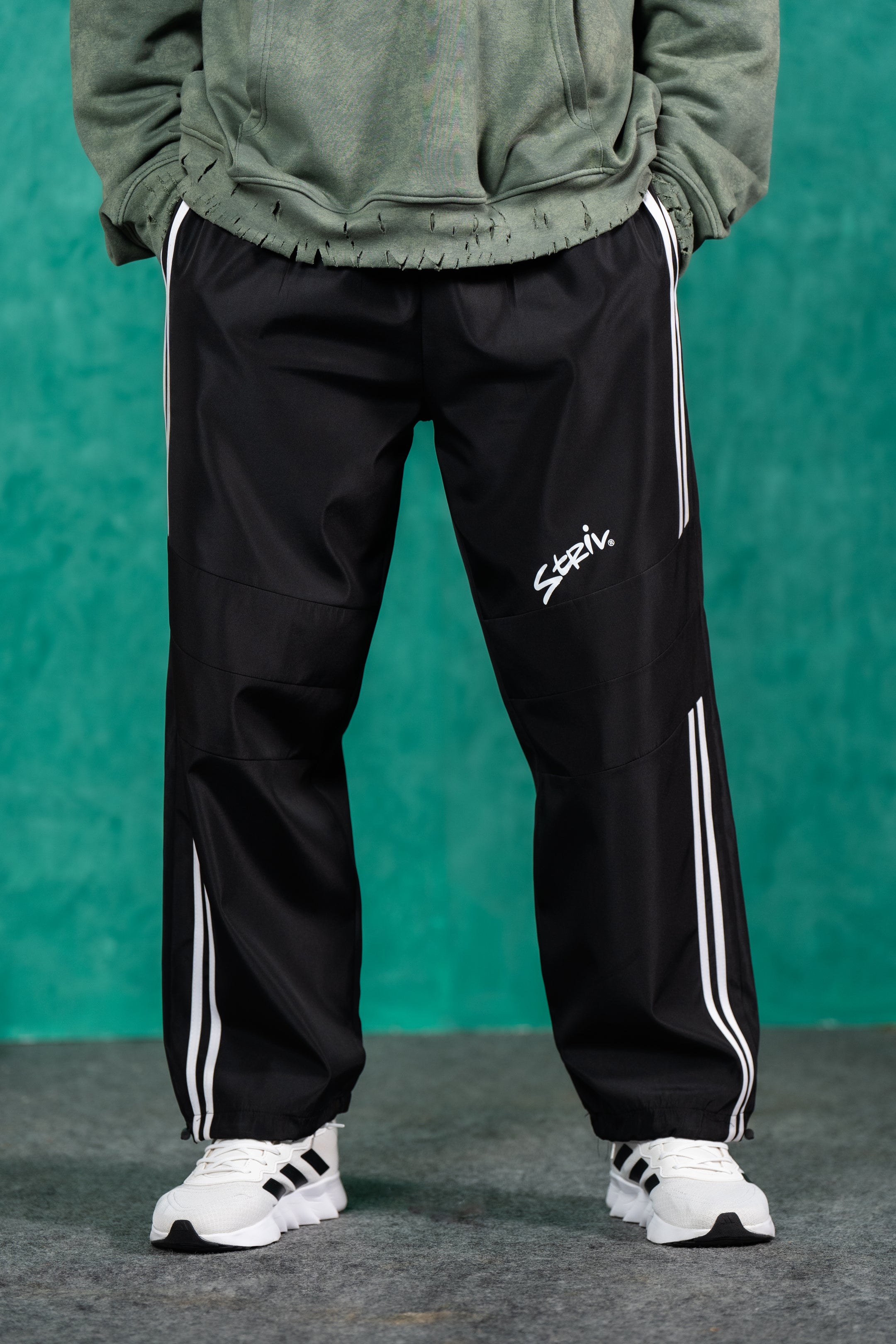 STRIV TRACK PANTS